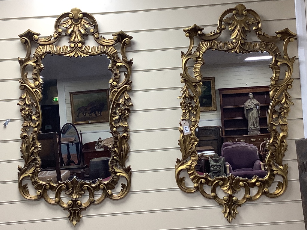 A pair of Georgian style giltwood wall mirrors, width 55cm height 106cm H 107cm